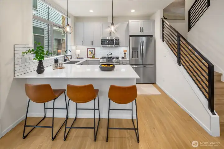 Another shot of the kitchen, also shown are the stairs heading up to the second level where we'll head momentarily.