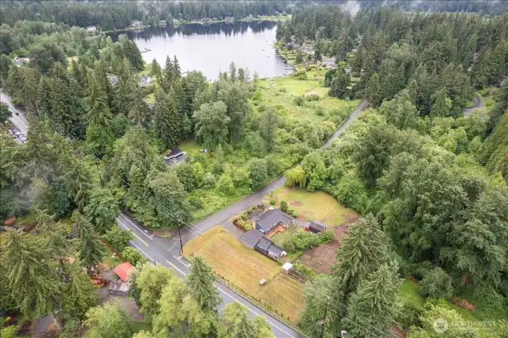 Ariel view with cottage lake Ariel view with cottage lake