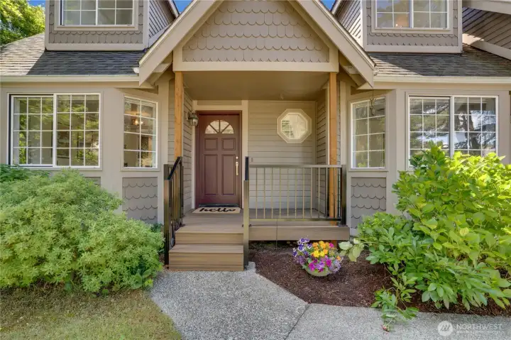 Long-lasting Trex decking creates an attractive front porch and a pleasant place to pause before heading inside. Long-lasting Trex decking creates an attractive front porch and a pleasant place to pause before heading inside.