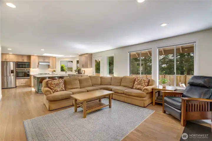 Large windows bring in natural light while the family room offers plenty of space to spread out and relax. Whether hosting friends, enjoying movie night, or simply unwinding at the end of the day, this room adapts easily to the moment. Large windows bring in natural light while the family room offers plenty of space to spread out and relax. Whether hosting friends, enjoying movie night, or simply unwinding at the end of the day, this room adapts easily to the moment.