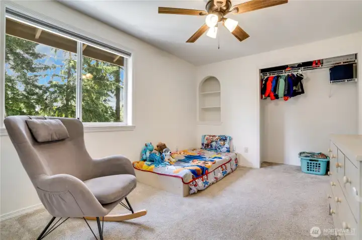 A generous closet provides plenty of storage, while the wall niche adds character and offers a spot to display favorite books, artwork, or décor. A generous closet provides plenty of storage, while the wall niche adds character and offers a spot to display favorite books, artwork, or décor.