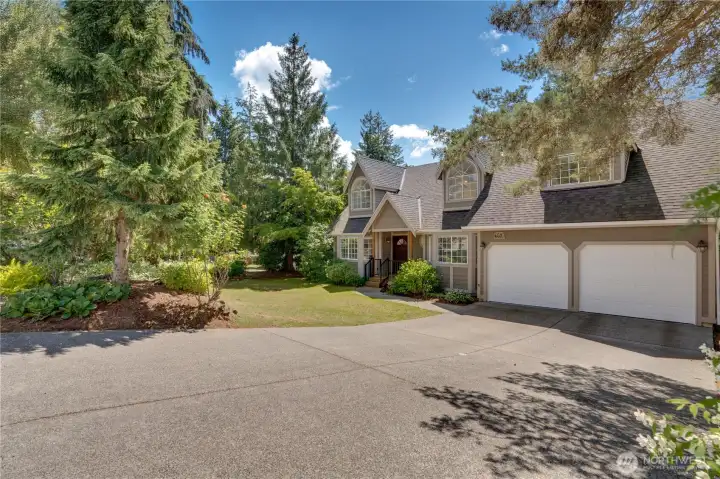 Before you leave, take one more look at the new garage doors, updated front porch, and wide driveway with ample parking. Before you leave, take one more look at the new garage doors, updated front porch, and wide driveway with ample parking.