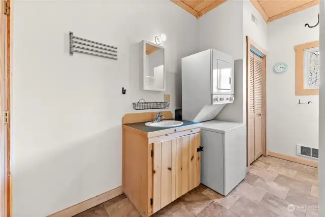 Laundry with lower bathroom