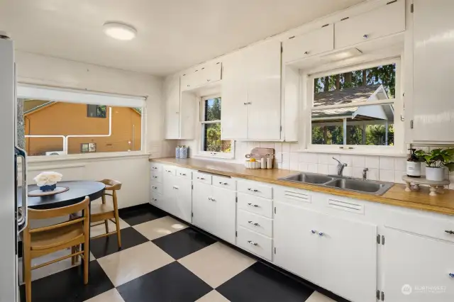 A wall of cabinets and counters.