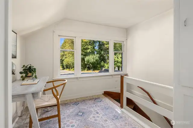 The upstairs landing has space for a desk, or ?