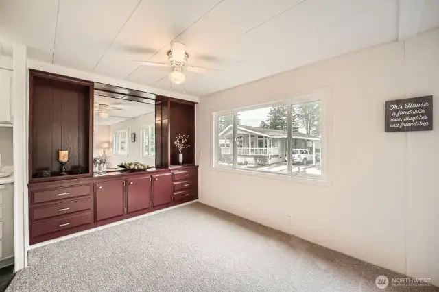 Splendid solid wood built-in cabinets are useful for displays and entertaining