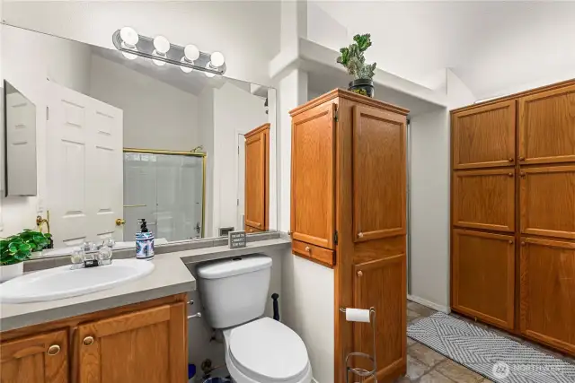 Main bath (full bathtub), lots of storage.