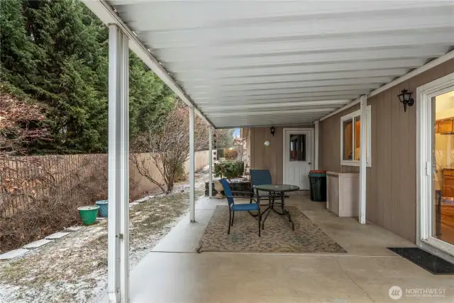 Covered patio to garage, and kitchen area