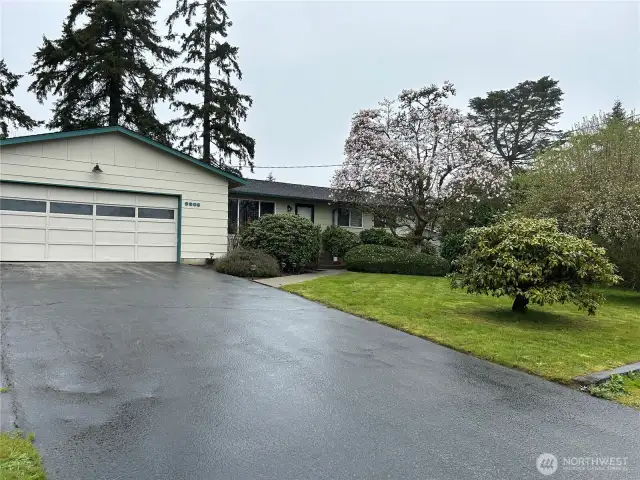 Tons Of Parking Here! 2-Car Garage, Huge Driveway PLUS Off Street Parking In Front!
