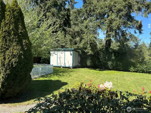 Beautiful Backyard With Shed/Workshop With Power! Mature Landscaping And Privacy! Enjoy your serenity in the peaceful backyard.