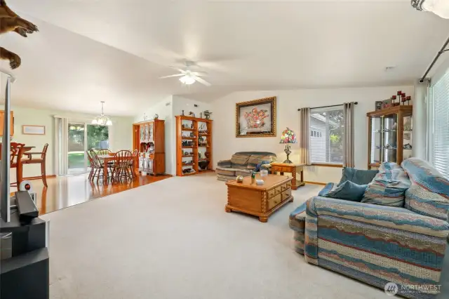 View of living room and dining area from entry.
