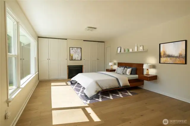Primary suite with propane fireplace and built-in wardrobes