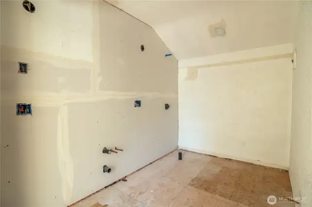 Third bathroom, in primary suite, with electrical and plumbing rough-in complete