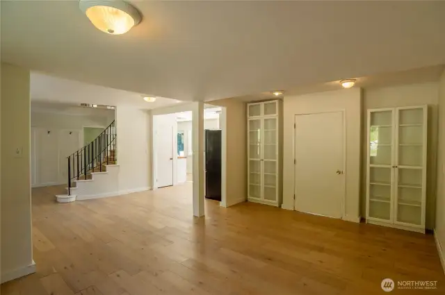 Living room looking toward kitchen and entryway