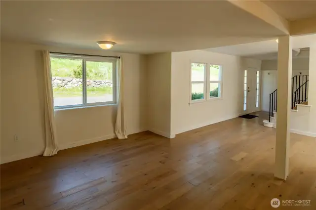 Living room looking toward front of home and entryway