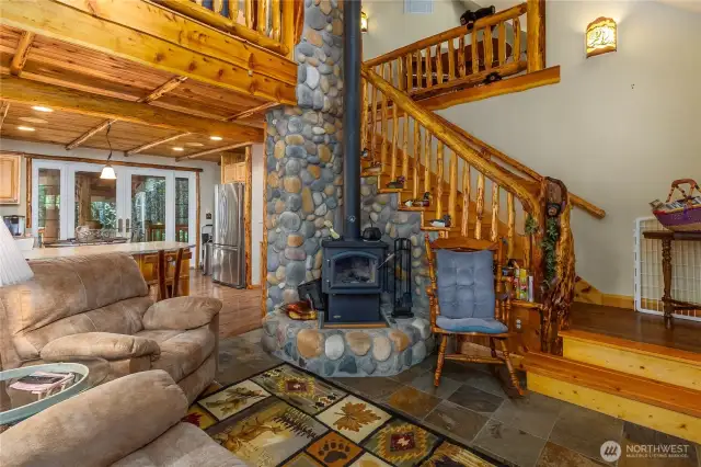 I am cute and maybe hidden, I am carved into the staircase railing can you find me.