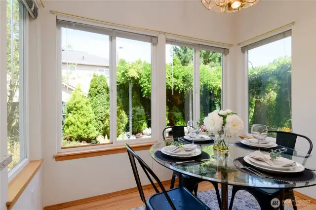 Enjoy the benefits of an inviting eat-in kitchen designed for both style and function. With serene garden views just beyond the windows, this space becomes more than just a place to prepare meals—it becomes a daily retreat. Whether you're sipping your morning coffee or hosting a casual brunch, the natural scenery brings a sense of calm and connection to the outdoors.