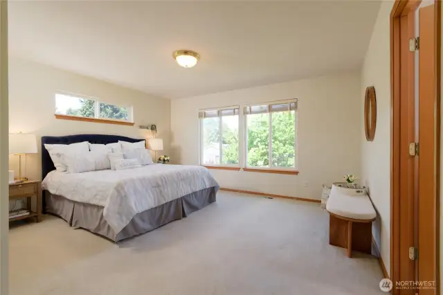 Spacious Primary Suite with dual closets and private En Suite-an inviting retreat with room to unwind, this luxurious suite provides a peaceful escape from the day with comfort at every turn.