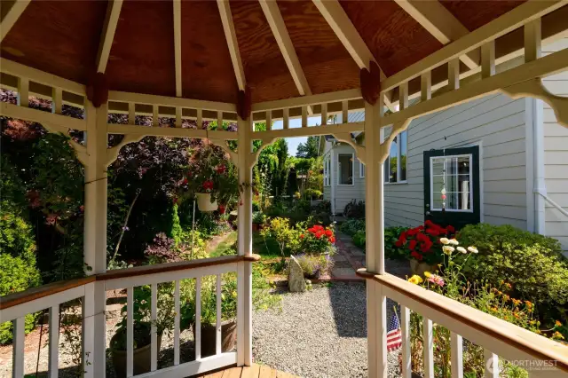 Relax to the sights and sounds of the local bird population stopping by to enjoy the stunning bounty of flowers.