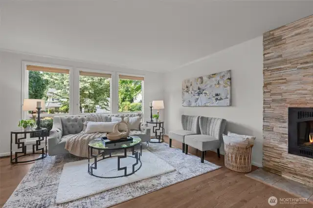 The living room showing off the natural light and warm hardwood flooring.