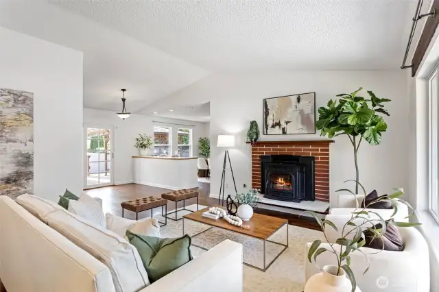 New interior paint throughout the home and vaulted ceilings create a bright, open living space.