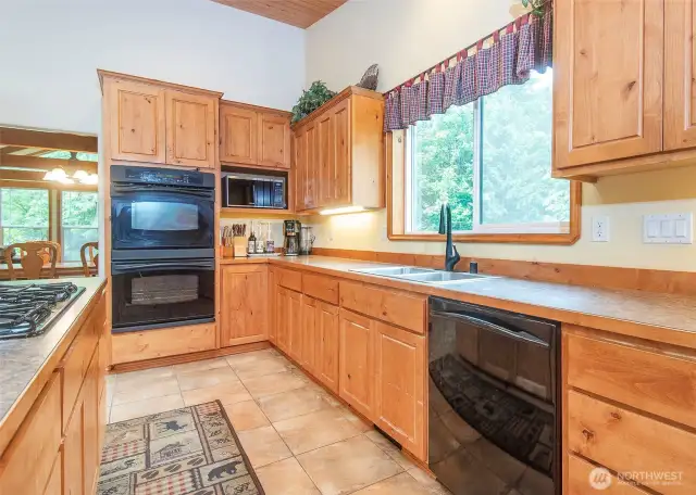 Well equipped kitchen with double ovens and a ton of cabinet space.