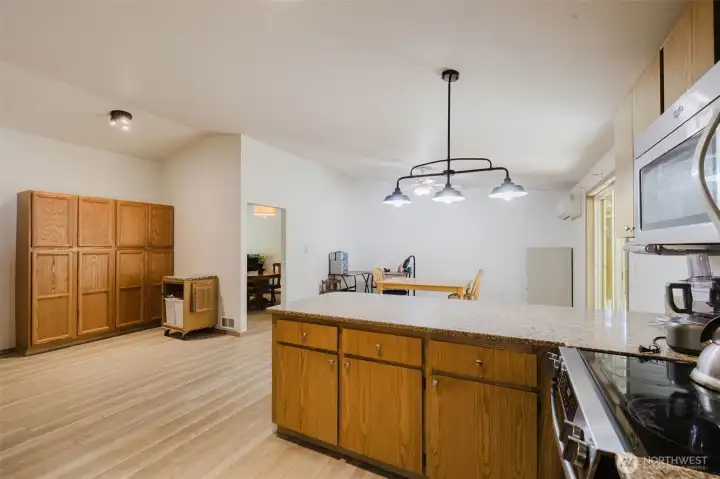 Kitchen with extensive built in storage cabinets.