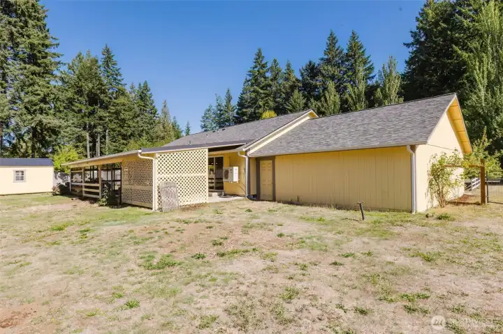 Another side of house & rear side of garage.