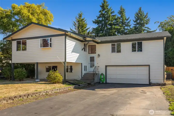1968 split level. 2 car garage with shop area. Plenty of driveway parking too.