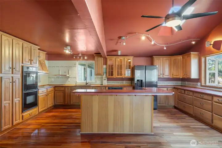 Generously sized eat-in kitchen - room for casual seating too! New fridge in 2022