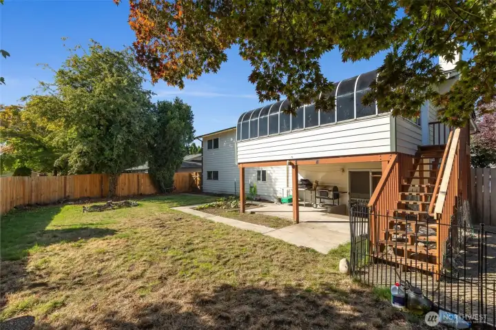 Expansive back garden with dog run area.