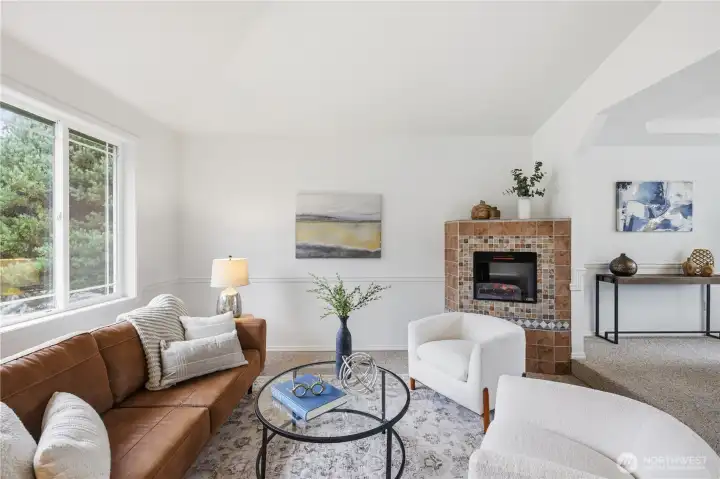 Front formal living, opening to formal ddning room