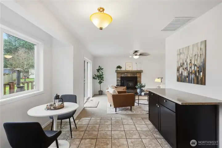 Kitchen eating area open to family room