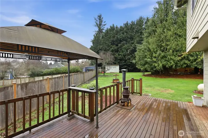 Back deck and view of south side of yard