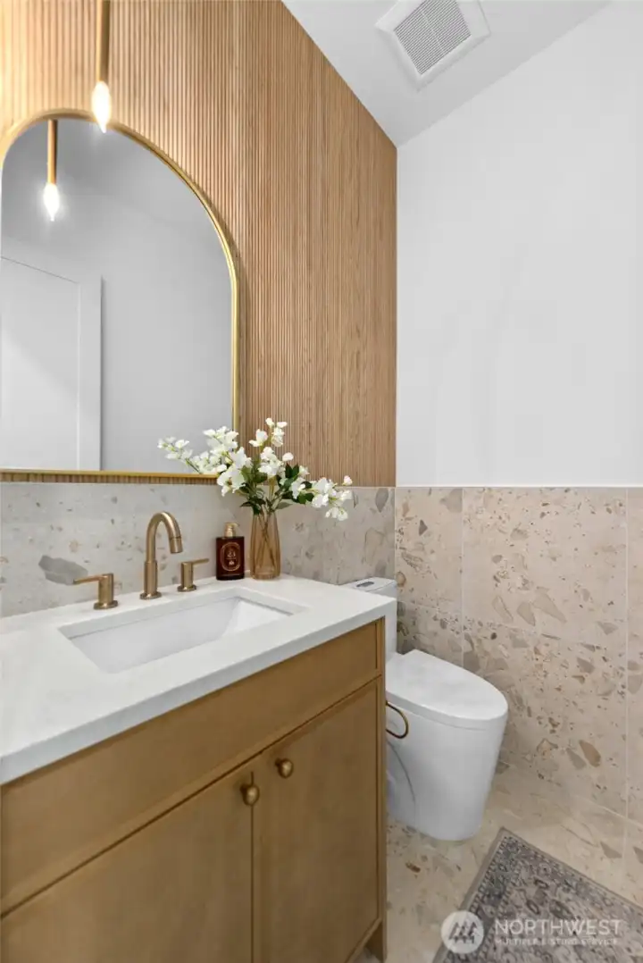 Convenient powder room on the main level.