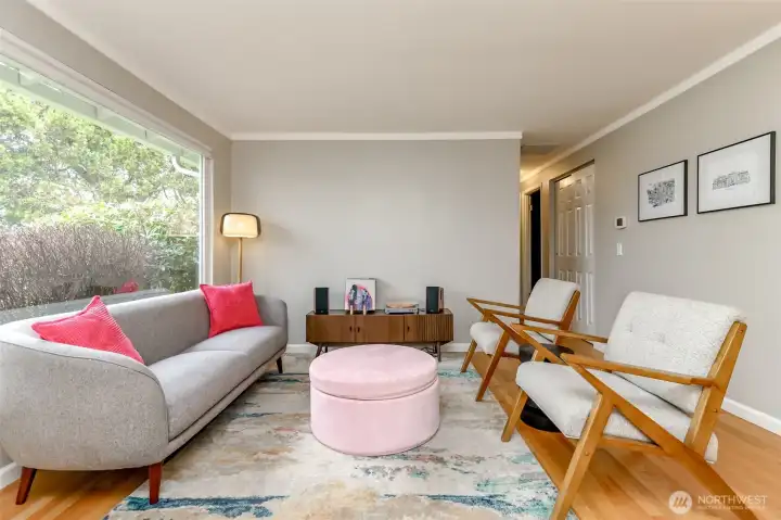 Hardwood floors and new paint with large window