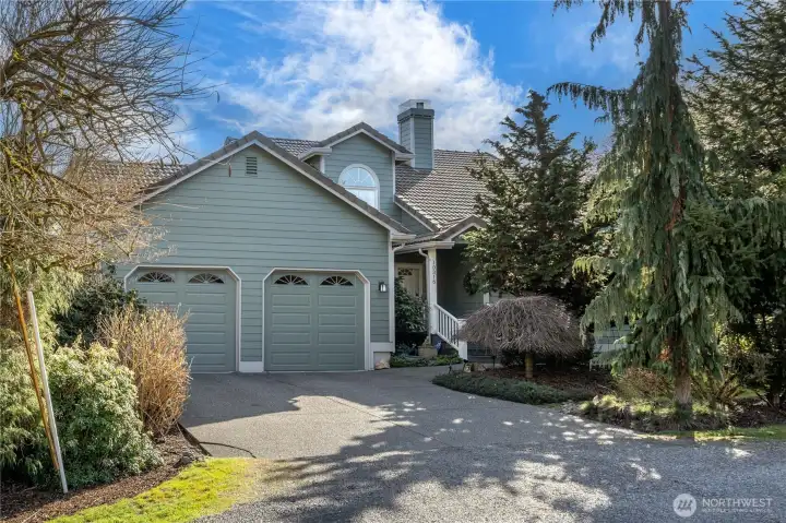 Exquisitely maintained home and grounds.  Attached garage