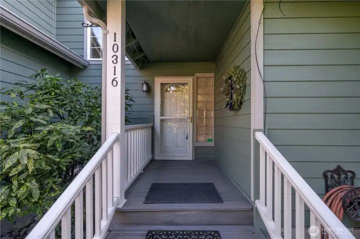 Covered front porch, keeps you out of the rain.