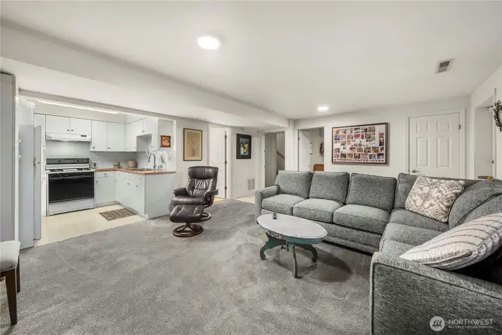 Lower level ADU completed with living room and kitchen, 1 bedroom and a full bath.