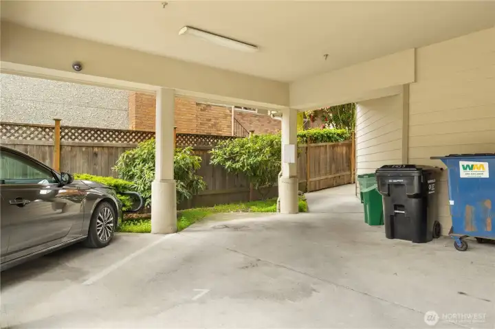 Dedicated and covered parking space in the rear of the building.