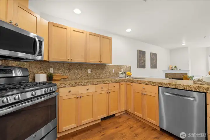 Solid surface counter tops and generous cabinet space.