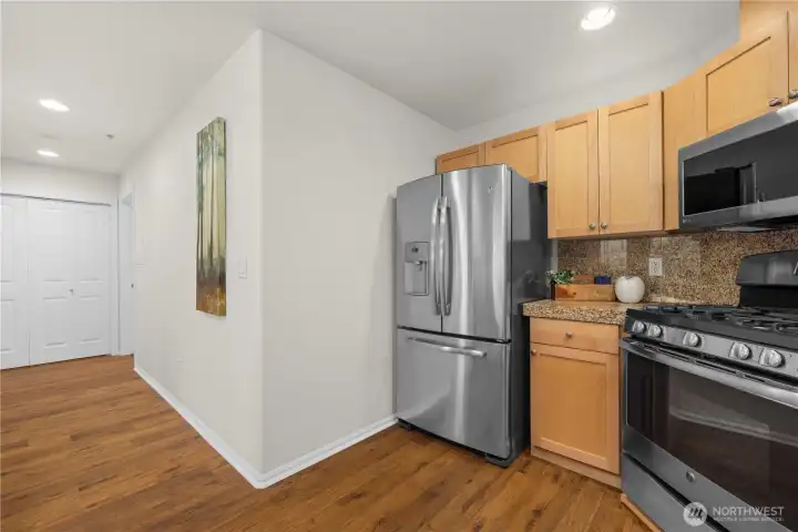 Fresh paint, stainless steel fridge, range and microwave.