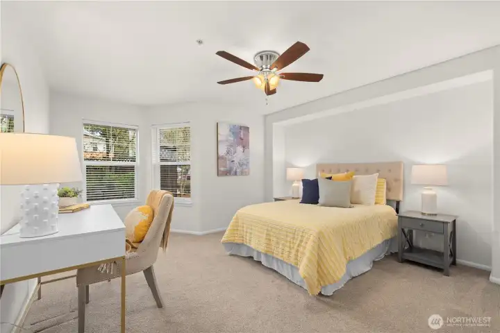 Large bedroom has fresh paint and plenty of natural light.