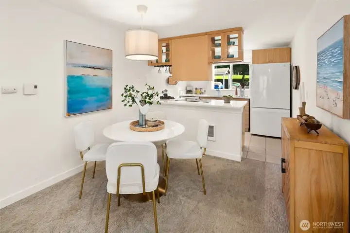 Bright, open dining area flows nicely into the kitchen.