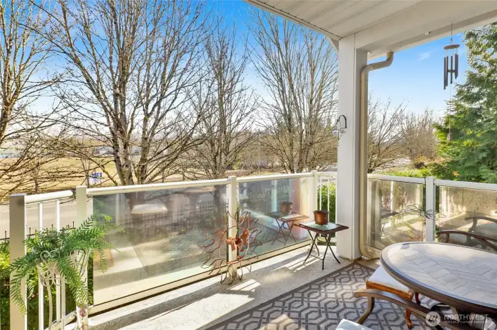 When the leaves have fallen, enjoy a lovely filtered view of Mt. Baker in the distance. Come spring, lush greenery surrounds the home, filling the space with natural beauty, peace, and privacy.