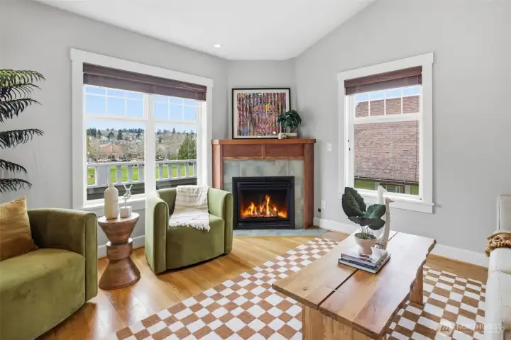 Hardwood floors, vaulted ceilings and gas fireplace.