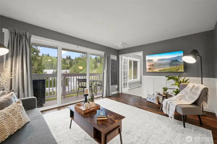 Enjoy an Evening on Your Private Deck with Views of Lake Washington and French Doors Leading into the Bedroom.