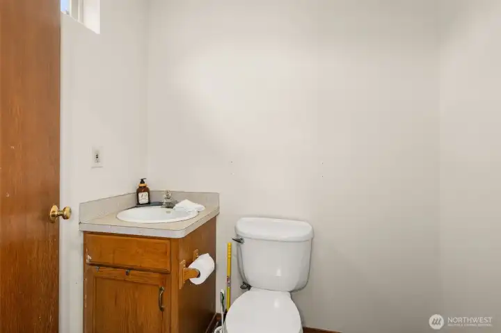 Space has a toilet and is plumbed for a shower and kitchen