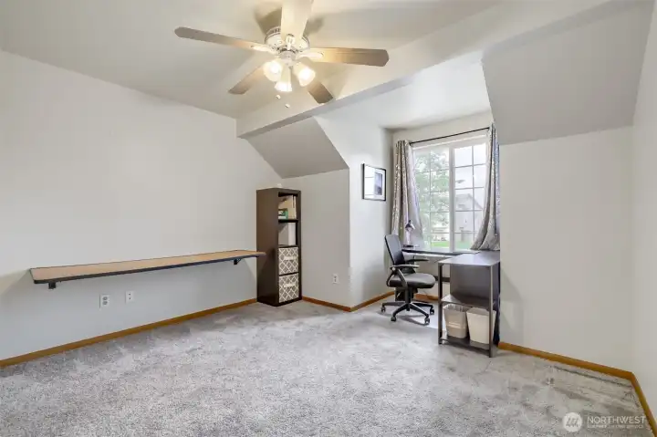 Additional bedroom offers flexibility for guests, hobbies, or work-from-home needs.