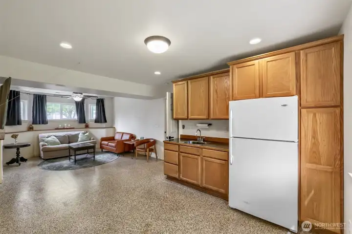 Kitchenette creates opportunities for extended living arrangements.